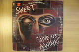 Give Us A Wink